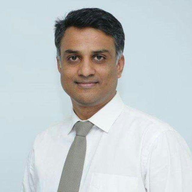 Dr. Avinash K M